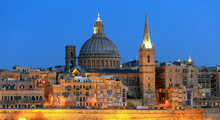 Valletta, Malta, Skyline In The Evening With The Dome Of The Carmelite Church And The Tower Of St Paul`s
