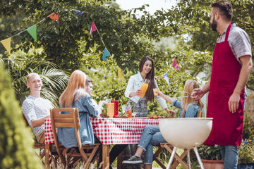 Friends partying in garden