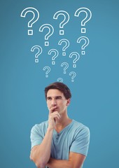Man thinking with question marks