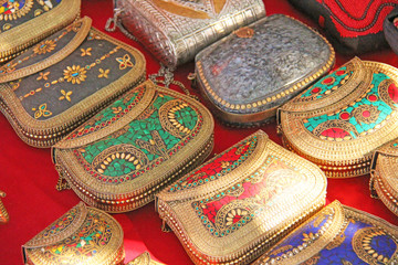 Wall Mural - Fine beautiful small handbags mosaic are sold on the market in India. Gift souvenir India Tibet Bazaar