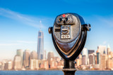 Fototapeta  - tourist binoculars at Liberty Island in front of Manhattan Skyline, New York City, USA