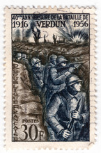 Leeds, England - April 20 2018: An Old Blue French Postage Stamp With An Of World War One Soldiers In Trenches In The Battle Of Verdun
