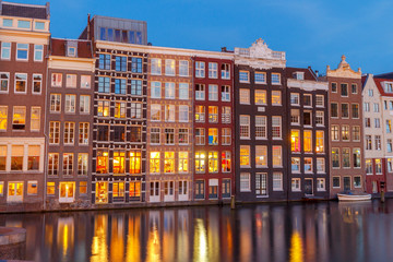 Wall Mural - Amsterdam. Night view of the houses along the canal.