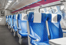Interior Of European First Class Passenger Train With Empty Seats.