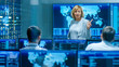 © Gorodenkoff - In the System Monitoring Room Senior Female Technician Holds Briefing for her Subordinates.