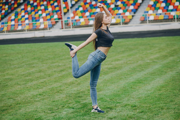 Wall Mural - sporty girl at the stadium