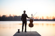 Cello cellist musician playing music as professional in summer while sunset, very relaxing