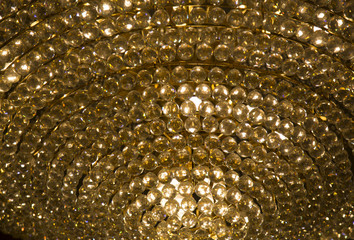 Wall Mural - gold cystal glass ball with warm ligh in chadelier