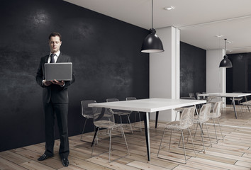 Wall Mural - Businessman in modern conference room