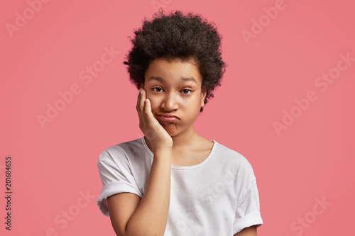 Photo Of Mixed Race Small Kid Feels Bored Wants To Play With