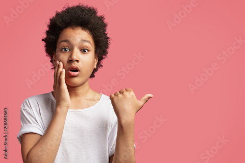 Emotional Mixed Race Male Child Has Afro Haircut Looks With