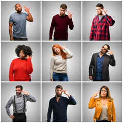 Canvas Print - Group of mixed people, women and men unhappy making suicide gesture, tired of everything. Shoots with hand imitating gun, upset