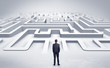 © ra2 studio - Businessman getting ready to enter a 3D flat labyrinth concept