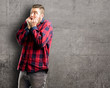 © Krakenimages.com - Young handsome man terrified and nervous expressing anxiety and panic gesture, overwhelmed