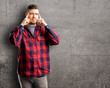 © Krakenimages.com - Young handsome man doubt expression, confuse and wonder concept, uncertain future