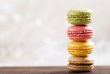 Wall Mural - colorful macaroons on wooden table