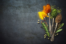 Various Herbs And Spices On Dark Background