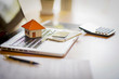 © EKKAPON - Rental agreement document with keys and Credit Cards