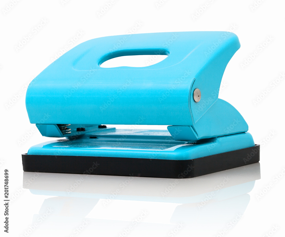 Office paper perforator isolated on white background with shadow reflection. Office tool that is used to create holes in sheets of paper. Paper Metal Stationary Hole Puncher. Office file-punch