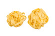 two balls of tagliatelle pasta isolated on white