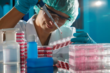 Canvas Print - female technician in laboratory of genetics - reprogenetics