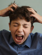teenager boy scratching head itch because of lice close up photo