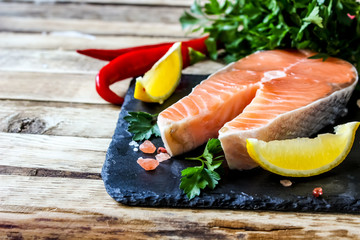 Wall Mural - Raw salmon fillet and ingredients for cooking