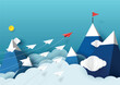 Paper airplanes flying above mountains and blue sky.Paper art style of business teamwork creative concept idea.