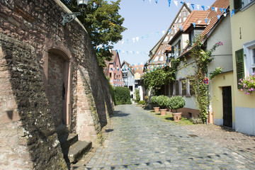 Small alley go to visit classic retro building and stone brick arch gate of Lobdengau Museum at Ladenburg town