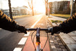 © David.Sch - First-person view of cyclist in the city at morning