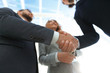 © ASDF - Photo of handshake of two happy businessmen