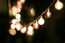 Chain Of Lights In Different Colous At A Little Party At Night