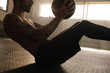 © Jacob Lund - Muscular man exercising with medicine ball at gym