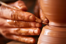 Close-up Hands Of A Male Potter In Apron Making A Vase From Clay, Selective Focus