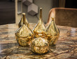 Four beautiful glossy golden vases - perfect luxirious interior element