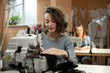 © kostyazar - Women dressmakers work in the workshop on sewing machines