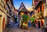 Fototapeta Uliczki - Colorful half-timbered houses in Eguisheim, Alsace, France