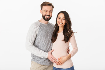 Sticker - Happy young man standing with his pregnant woman