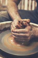 Pottery. The Master At The Potter's Wheel, Produces A Vessel Of Clay