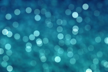 Wall Mural - Abstract shiny blue bokeh background. Glittering Backdrop
