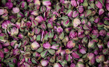Roses Pink, Dried On Heap. Antioxidant And Healthy Rosebuds For Background. Close Up View.