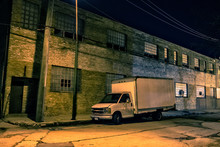 Truck Parked On A City Street By A Vintage Industrial Building