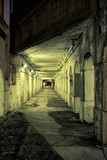 Fototapeta Uliczki - Vintage city bridge street tunnel at night