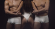 © Volodymyr - buttocks of sexy young woman at macho men. buttocks of sport woman in white sportswear.
