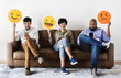 © Rawpixel.com - Diverse people sitting and holding emojis logos