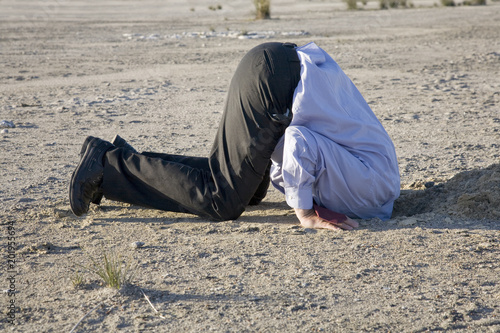 Fotografia, Obraz Bury your head in the sand or turn a blind eye.