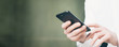 © Rymden - Male hands with mobile phone