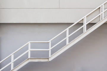 Wall Mural - white steel stair background, fire escape metal stair with white handrial.