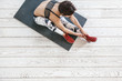 © Alena Ozerova - Woman doing fit exercise on white flooring