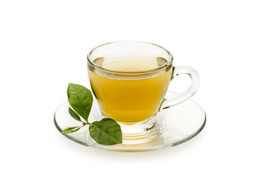 Poster - tea in glass cup with leaves, on white background